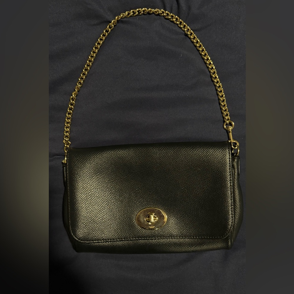 Coach handbag 
Used a few times 
Black and gold